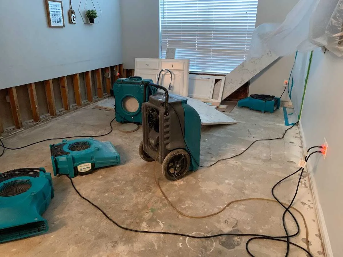 Dehumidifier in flood-cut room for Water Damage Restoration in Rushville